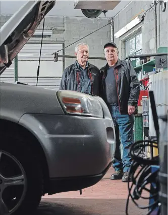  ?? GARY YOKOYAMA THE HAMILTON SPECTATOR ?? McDougall’s Garage, solid in the centre of Stoney Creek, is marking its 100th this year and garage patriarch Bob McDougall is turning 90. He still comes in every day. His son, young Bob, is 62 and he’s the head guy.