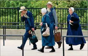  ??  ?? Des Amish vivent dix ans de plus que les autres américains.