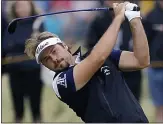  ??  ?? IN FULL SWING: Dubuisson has a chance of winning The Open