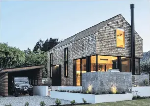  ??  ?? As the house faces the street, glazing is restrained and aimed towards views to the west of Mt Roy.