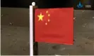 ?? Photograph: CNSA/Reuters ?? China’s national flag is seen unfurled on the moon from the Chang’e-5 spacecraft.