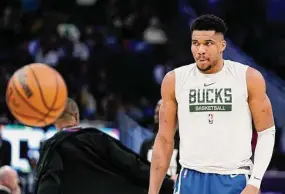  ?? Aaron Gash/Associated Press ?? The Bucks’ Giannis Antetokoun­mpo warms up before the second half against the Heat on Feb. 4.