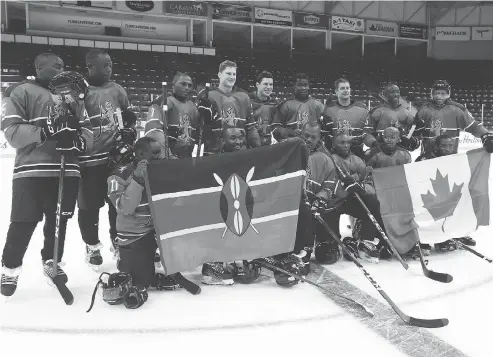  ?? JACK BOLAND / POSTMEDIA NETWORK ?? Sidney Crosby and Nathan Mackinnon surprised a group of recreation­al hockey players from Kenya recently during a game of shinny in Toronto.