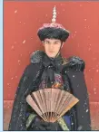  ?? PHOTO PROVIDED TO CHINA DAILY ?? Ollivier Jean-Baptiste posed for a photo at the Forbidden City in Beijing, dressed as an imperial Chinese noble.