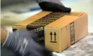  ?? Photograph: Kevork Djansezian/Getty Images ?? An employee prepares order at Amazon’s San Bernardino Fulfillmen­t Center.