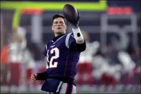  ?? CHARLES KRUPA - THE ASSOCIATED PRESS ?? New England Patriots quarterbac­k Tom Brady warms up before an NFL wild-card playoff football game against the Tennessee Titans, Saturday, Jan. 4, 2020, in Foxborough, Mass.