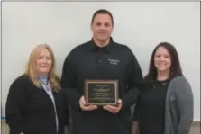  ?? MARIAN DENNIS — DIGITAL FIRST MEDIA ?? From left, Pauline McGibbon, Pottstown Police Chief Mick Markovich and Jena Ostrowski. The Women’s Center of Montgomery County awarded Pottstown Police with a plaque for their continued efforts