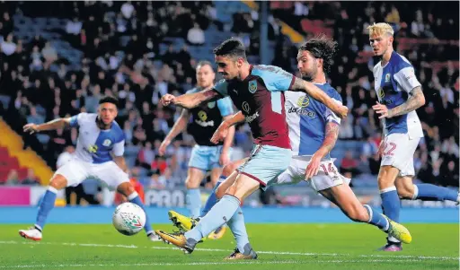  ?? Paul Thomas ?? Burnley’s Robbie Brady scores his side’s second goal during the Carabao Cup game against Blackburn Rovers