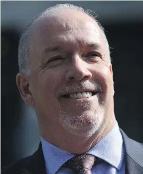  ?? — THE CANADIAN PRESS ?? B.C. Premier John Horgan’s NDP government will hold public consultati­ons for the mail-in ballot on electoral reform slated for next fall.