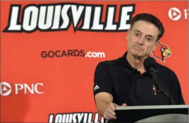  ?? ASSOCIATED PRESS FILE ?? Louisville head coach Rick Pitino responds to a question in 2015.