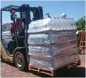  ??  ?? RELIEF: More than 60 000 five-litre bottles of water were donated.