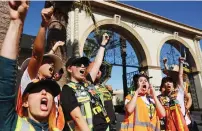  ?? — afp file ?? SAG-AFTRA members chant slogans outside Paramount Studios during their strike against the Hollywood studios last year.