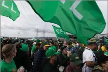  ?? BENJAMIN FANJOY/SAN FRANCISCO CHRONICLE VIA AP ?? A group of fans and protesters gather in the parking lot outside the Oakland Coliseum before the Oakland Athletics played against the Cleveland Guardians in a baseball game on opening day, Thursday, March 28, 2024, in Oakland, Calif.