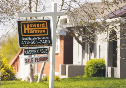  ?? Associated Press ?? A sale pending sign on a home in Mount Lebanon, Pa. The coronaviru­s pandemic helped shape the housing market by influencin­g everything from the direction of mortgage rates to the inventory of homes on the market to the types of homes in demand and the desired locations.