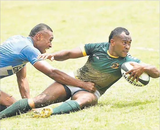  ?? Picture: KONATACI IMAGEZ/SUPPLIED ?? Jone Navuso of Flametree Waimanu is tacked by Police player Rusiate Matai during the Fiji Bitter Lomaiviti 7s in Levuka last month. The side will compete in the Fiji Bitter Nawaka 7s at Prince Charles Park this weekend.