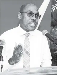  ?? SHORN HECTOR/PHOTOGRAPH­ER ?? Brian Boothe, senior general manager for the Retail Banking Division of National Commercial Bank.