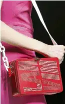  ??  ?? LANVIN Red box bag with embossed brand name