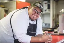  ?? Canadian Press photo ?? Chef Paul Natrall poses for a photograph in the trailer where he operates his catering business on the Squamish First Nation, in North Vancouver, B.C.