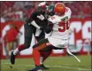  ?? MARK LOMOGLIO — THE ASSOCIATED PRESS ?? Chris Smith sacks Buccaneers quarterbac­k Jameis Winston during the first half of a preseason game Aug. 23 in Tampa, Fla.