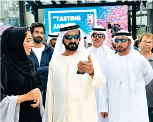  ?? Wam ?? CREATIVE IDEAS, SMART VISION: Sheikh Mohammed tours the third edition of the Dubai Canvas 3D Art Festival 2017 in City Walk on Friday. He said the city seeks to be a hub of ideas. —