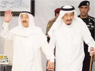  ?? — AFP ?? JEDDAH: A handout picture shows Saudi’s King Salman Bin Abdulaziz Al-Saud and Kuwait’s Amir HH Sheikh Sabah Al-Ahmad Al-Jaber Al-Sabah arriving for a meeting in the Red Sea city of Jeddah. Kuwait,s Amir travelled to Saudi Arabia for talks aimed at...