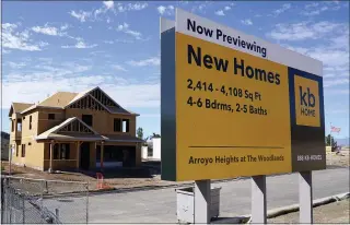  ?? MARK J. TERRILL — THE ASSOCIATED PRESS ?? A constructi­on site, earlier this month in Simi Valley, California. U.S. home constructi­on has fallen sharply, but economists are optimistic housing will bounce back.