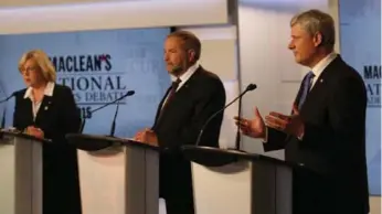  ?? CNW GROUP/MACLEAN’S ?? A reader wonders if it would be unethical to break party allegiance by strategica­lly voting against Conservati­ve Leader Stephen Harper, right, seen here in an August debate with Elizabeth May, left, and Thomas Mulcair, centre.