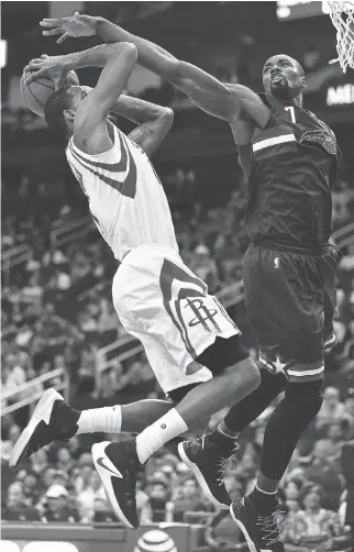  ?? ERIC CHRISTIAN SMITH/THE ASSOCIATED PRESS ?? Orlando Magic forward Serge Ibaka, right, is close with Toronto Raptors president Masai Ujiri and could provide some of the tenacity missing from the team’s defensive play.