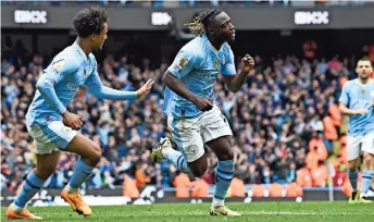  ?? ?? JEREMY DOKU del Manchester City celebra tras anotar el cuarto gol de su equipo