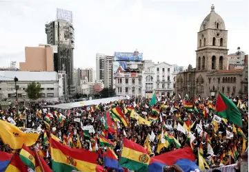  ??  ?? Opposition supporters gather in Plaza San Francisco during a rally marking the third anniversar­y of a referendum aimed at blocking Morales from re-election in La Paz, Bolivia. — Reuters photo