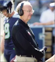  ?? Ted S. Warren / Associated Press ?? John “The Professor” Clayton, an NFL football writer and reporter for ESPN, stands on the sideline during a game between the Seattle Seahawks and the San Francisco 49ers in 2016.