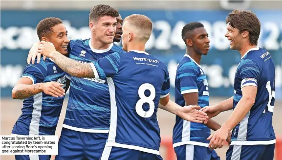  ?? ?? Marcus Tavernier, left, is congratula­ted by team-mates after scoring Boro’s opening goal against Morecambe