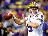  ?? MARIANNA MASSEY / GETTY IMAGES ?? Former LSU quarterbac­k Joe Burrow said, “I’m going to try to find a veteran who has done it for 10-plus years and try to mimic what he does.”