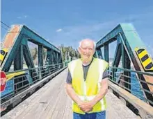  ?? CAPE BRETON POST FILE PHOTO ?? This Cape Breton Post file photograph shows Bob (Bridge Man Bob) Martell standing on the Brickyard Road side of the old Mira Gut bridge. The span was taken down in 2017. The province has announced that work on a new bridge will begin in the spring of 2021 and is expected to be completed by the summer of 2020.