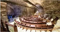  ?? (The Western Wall Heritage Foundation) ?? THE NEW SYNAGOGUE, deep inside the Western Wall tunnel complex, was inaugurate­d on Monday after candle lighting for the seventh night of Hanukka.