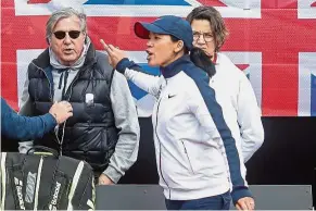  ??  ?? A piece of her mind: Britain captain Anne Keothavong (centre) gestures towards Romania’s Ilie Nastase (left) during their Fed Cup tie in Constanta, Romania, on Saturday.
