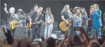  ??  ?? OTHER Stagecoach performers join Nelson onstage in a salute to the singer, who has a new album out.