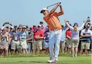  ?? [AP PHOTO] ?? Rickie Fowler plays his shot from the 13th tee during the final round of the U.S. Open on Sunday in Southampto­n, N.Y.