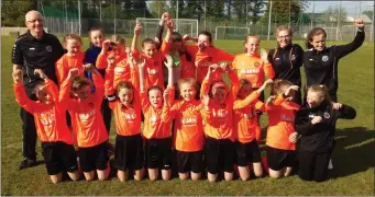  ??  ?? Sligo/Leitrim U12 girls who won the Regional finals of the Interleagu­e with coaches Brian Chambers, Laura McGuinn, Amy Hyndman and Yasmin Connolly after the nerve-racking penalty shoot-out.