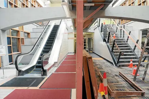  ??  ?? Invercargi­ll library: Out with the old, left, and in with the new, right.