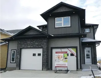  ??  ?? This show home by Streetscap­e Homes is at 554 Childers Crescent in Kensington.