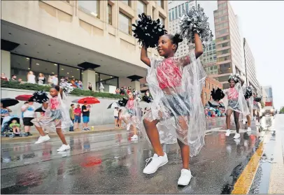 ?? [ADAM CAIRNS/DISPATCH] ?? Jakaylaah Davis, 9, of the Columbus Red Diamonds dances during the Red, White & Boom parade through Downtown.