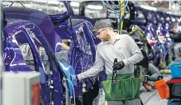  ??  ?? OUTPUT: Car making firms report production has been growing