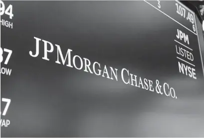  ?? RICHARD DREW AP ?? Shares of some major banks fell after a report alleging that Jpmorgan Chase & Co., HSBC, Standard Chartered Bank, Deutsche Bank and Bank of New York Mellon continued to profit from illicit dealings with criminal networks.