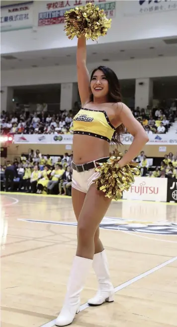  ?? Courtesy of Sunrockers Shibuya ?? Ogasawara excites the crowd at a basketball game in Sumida Ward, Tokyo, in October 2019.