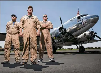  ?? JAY JANNER / AMERICAN-STATESMAN ?? Juan Jimenez (from left), Chris Dowell and Rick Kelley, of the Commemorat­ive Air Force Highland Lakes Squadron, stand in front of the Bluebonnet Belle C-47 cargo plane at the Burnet Municipal Airport on Wednesday. The plane flew some 2,500 miles on Harvey relief missions.