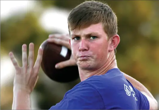  ?? Dan Watson/The Signal (See additional photos on signalscv.com) ?? Quarterbac­k Ryan Morrison throws at Valencia High practice on Tuesday. He was named the starting quarterbac­k for the 2019-20 football season over summer.