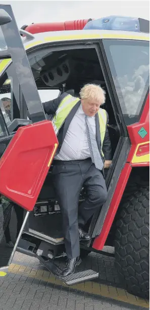 ?? PICTURE: ADRIAN DENNIS/PA ?? ON THE GROUND: Boris Johnson gets off a fire and rescue vehicle in Southampto­n.