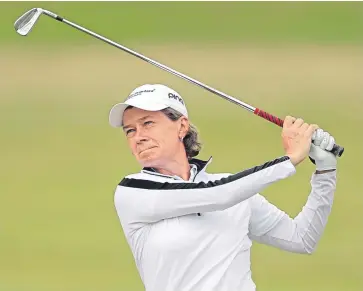  ?? Picture: Getty. ?? Scotland’s Catriona Matthew plays her approach to the second green.