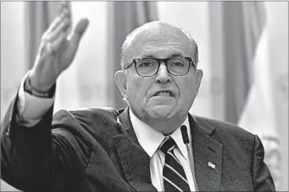  ?? ANGELA WEISS/GETTY ?? Rudy Giuliani, speaks to the Organizati­on of Iranian American Communitie­s during their march to urge “recognitio­n of the Iranian people’s right for regime change,” outside the United Nations Headquarte­rs in New York in September.